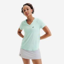 Koszulka tenisowa damska Kuikma Dry. Niebieskie bluzki damskie KUIKMA, xs, bez wzorów, z elastanu, bez kołnierzyka. Za 59.99 zł.