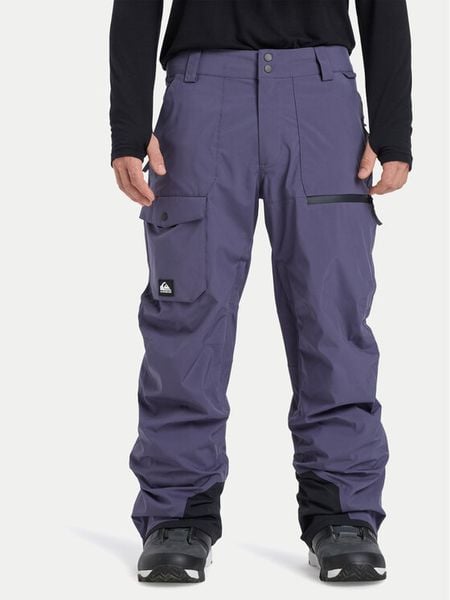 Quiksilver Spodnie snowboardowe Utility EQYTP03235 Granatowy Modern Fit. Niebieskie spodnie materiałowe męskie Quiksilver, bez wzorów, z syntetyku, sportowe. Za 419.99 zł.