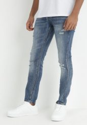 Niebieskie Jeansy Skinny z Przetarciami i Dziurami Leonia. Niebieskie jeansy męskie Born2be. Za 39.99 zł.