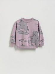 Bluza z nadrukiem - jasnofioletowy. Fioletowe bluzy i bluzki niemowlęce Reserved, bez wzorów, z bawełny, bez ramiączek, bez kaptura. Za 39.99 zł.