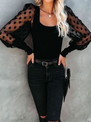 Milan Kiss Bluzka w kolorze czarnym rozmiar: XL. Czarne bluzki damskie Milan Kiss, xl, bez wzorów, bez kołnierzyka, bez ramiączek. Za 127.35 zł.