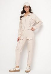 Jasnobeżowy Komplet Dresowy Bluza Rozpinana i Spodnie Slim w Stylu Utility Telavienna. Brązowe bluzy bez kaptura damskie Born2be, m, z dresówki. Za 84.99 zł.