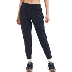 Spodnie sportowe damskie Under Armour Unstoppable Jogger. Czarne spodnie sportowe damskie Under Armour, l, z dresówki, na fitness i siłownię. Za 537.00 zł.