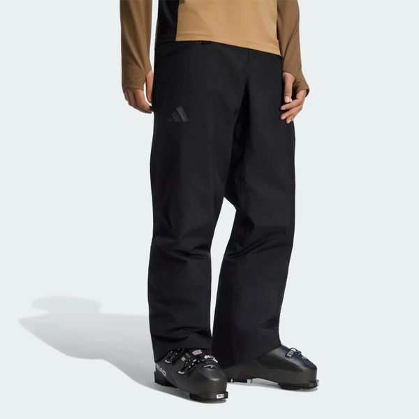 Dwuwarstwowe ocieplane spodnie Terrex Multi CLIMAPROOF. Czarne spodnie materiałowe męskie Adidas, bez wzorów, z materiału, klasyczne, z standardowym stanem. Za 899.00 zł.