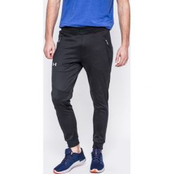 Under Armour - Spodnie Reactor Tapered. Czarne spodnie sportowe męskie Under Armour, z dzianiny. W wyprzedaży za 239.90 zł.