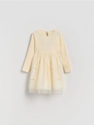 Sukienka z tiulowym dołem - kremowy. Białe sukienki dziewczęce Reserved, bez wzorów, z dzianiny, bez ramiączek. Za 79.99 zł.