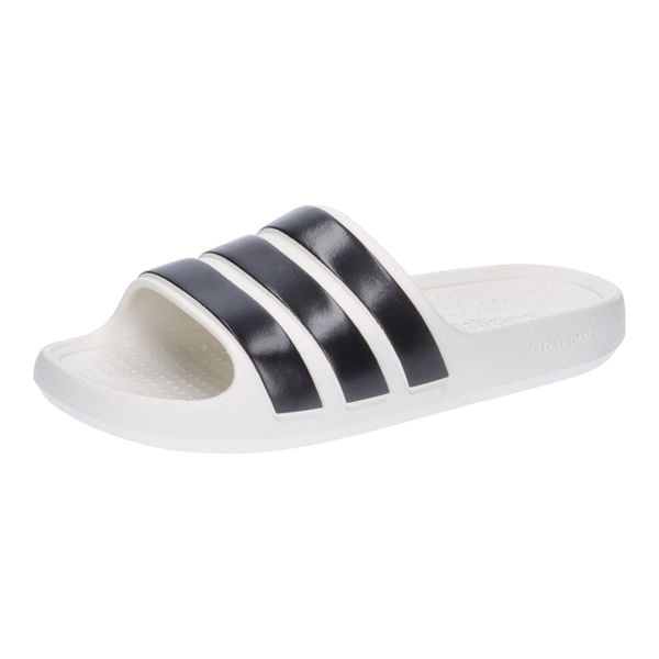 Sandały Dorosły Adidas Adilette biały. Białe klapki i japonki męskie Adidas, z materiału, bez zapięcia. Za 144.45 zł.