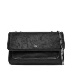 Torebka Calvin Klein Jeans. Czarne torebki klasyczne damskie Calvin Klein Jeans, bez wzorów, z jeansu, wizytowe, bez kołnierzyka, bez ramiączek. Za 349.99 zł.