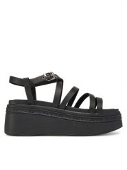 Tommy Jeans Sandały Tjw Wedgy Strappy Sandal EN0EN02756 Czarny. Czarne sandały damskie Tommy Jeans, bez wzorów, z jeansu, bez obcasa, na koturnie. Za 239.99 zł.