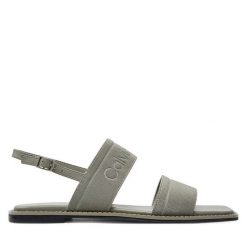 Sandały Calvin Klein. Szare sandały damskie CALVIN KLEIN, bez wzorów, bez obcasa, na płaskiej podeszwie. Za 569.99 zł.
