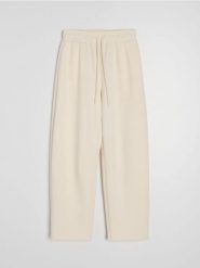 Dresowe spodnie barrel z dzianiny scuba - kremowy. Białe spodnie sportowe damskie Sinsay, l, z dresówki. Za 49.99 zł.