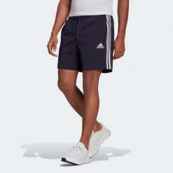 Spodenki fitness męskie Adidas. Niebieskie szorty męskie Adidas, m, z bawełny, na fitness i siłownię. Za 99.99 zł.