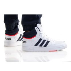 Buty adidas Hoops 3.0 Mid M GY5543 białe granatowe. Białe buty sportowe na co dzień męskie z gumy, bez zapięcia. Za 449.26 zł.