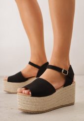 Czarne Sandały na Koturnie z Plecionki z Zapięciem na Sprzączkę przy Kostce Honese. Czarne sandały damskie Born2be, bez wzorów, bez obcasa, na koturnie. Za 139.99 zł.