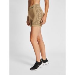 Damskie półwysokie spodenki typu bib Hummel Shaping. Brązowe szorty damskie HUMMEL, bez wzorów, sportowe. Za 119.50 zł.