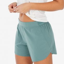 Spodenki pod sukienkę Quechua NH. Zielone szorty damskie QUECHUA, bez wzorów, z elastanu, sportowe. Za 49.99 zł.