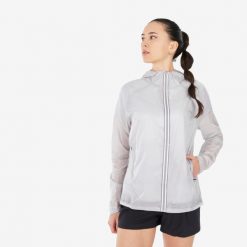 Kurtka turystyczna damska Quechua MH900 Light. Niebieskie kurtki damskie QUECHUA, l, bez wzorów, z materiału, bez kaptura. W wyprzedaży za 89.99 zł.