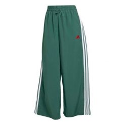 Spodnie damskie adidas 3-Stripes. Zielone spodnie materiałowe damskie Adidas, bez wzorów, z poliamidu, sportowe. Za 289.50 zł.