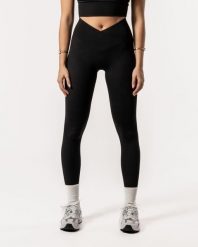 Damskie legginsy z kopertowym wysokim stanem, bez przedniego szwu – czarny. Czarne legginsy sportowe damskie AESTHETIC WOLF, s, bez wzorów, z materiału, z podwyższonym stanem, na fitness i siłownię. Za 269.99 zł.