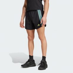 Szorty Own the Run 3-Stripes. Czarne szorty męskie Adidas, bez wzorów, z materiału, sportowe. W wyprzedaży za 193.95 zł.