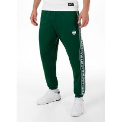 Spodnie męskie Oldschool Tape Logo. Niebieskie spodnie sportowe męskie PITBULL. Za 229.00 zł.