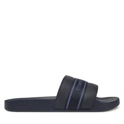 Klapki Tommy Hilfiger. Niebieskie klapki damskie Tommy Hilfiger, bez wzorów, bez obcasa. Za 119.99 zł.