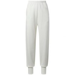 Spodnie dresowe Reebok Classics z francuskiego frotte. Białe spodnie sportowe damskie Reebok, s, z bawełny, na fitness i siłownię. Za 213.30 zł.