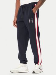 Tommy Hilfiger Spodnie dresowe Pique MW0MW44995 Granatowy Regular Fit. Niebieskie spodnie dresowe męskie Tommy Hilfiger, bez wzorów, z dresówki. Za 649.99 zł.