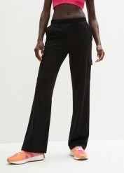 Spodnie sportowe z elastycznego materiału z bawełną. Czarne spodnie dresowe damskie bonprix, bez wzorów, z bawełny. Za 109.99 zł.