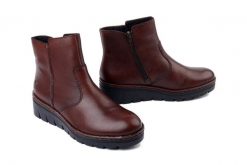 RIEKER X9165-27 brown, botki damskie. Brązowe botki damskie Rieker, bez obcasa, na koturnie, bez zapięcia. Za 314.93 zł.