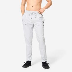 Spodnie fitness męskie Domyos. Spodnie sportowe męskie DOMYOS, z elastanu. Za 89.99 zł.