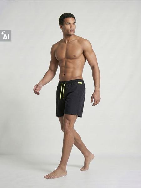 Szorty kąpielowe z odblaskowymi elementami U DYNAMIC - czarny. Czarne szorty sportowe męskie Sinsay, l. Za 29.99 zł.