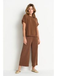 Rich & Royal Spodnie w kolorze jasnobrązowym rozmiar: S. Brązowe spodnie materiałowe damskie Rich & Royal, bez wzorów, z materiału. Za 299.95 zł.