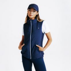 Kamizelka jeździecka damska Fouganza 500 ciepła. Fioletowe kamizelki damskie FOUGANZA, m, z materiału. Za 149.99 zł.