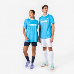 Koszulka piłkarska dla kibiców Argentyna 2026. Białe t-shirty damskie KIPSTA, xl, z materiału, bez ramiączek, do piłki nożnej. Za 44.99 zł.