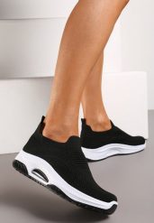 Czarne Wsuwane Buty Sportowe na Koturnie z Perforacją Mellarina. Czarne czółenka damskie Born2be, bez wzorów, bez obcasa, na koturnie. Za 44.99 zł.