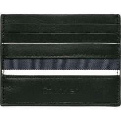 Calvin Klein - Portfel skórzany. Czarne portfele męskie CALVIN KLEIN, bez wzorów, z materiału. W wyprzedaży za 119.90 zł.
