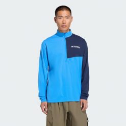 Koszulka Terrex Multi Climacool 1/2 Zip Long Sleeve. Niebieskie koszulki męskie z długim rękawem Adidas. Za 259.00 zł.
