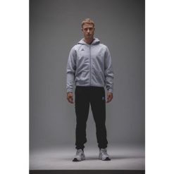 Kurtka z kapturem Erima Cmpt Wings Szara Junior. Czarne kurtki damskie Erima, bez wzorów, z materiału, sportowe, z kapturem. Za 329.99 zł.