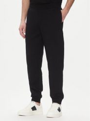 Armani Exchange Spodnie dresowe XM000744 AF13047 UC001 Czarny Regular Fit. Czarne spodnie dresowe męskie Armani Exchange, bez wzorów, z bawełny. Za 299.99 zł.