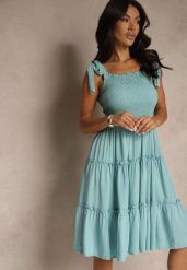 Jasnoniebieska Sukienka z Wiskozą o Rozkloszowanym Kroju na Ramiączkach z Wiązaniem Aranive. Niebieskie sukienki damskie Renee, na co dzień, m, bez wzorów, z wiskozy, eleganckie, bez kołnierzyka, bez ramiączek, midi, proste. W wyprzedaży za 52.49 zł.