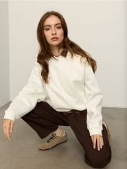 Bluza hoodie z bawełną - kremowy. Białe bluzy bez kaptura damskie Sinsay, l, bez wzorów, z bawełny, bez ramiączek, bez kaptura. Za 49.99 zł.