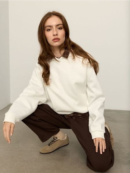 Bluza hoodie z bawełną - kremowy. Białe bluzy bez kaptura damskie Sinsay, l, z bawełny. Za 49.99 zł.