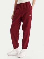 Calvin Klein Jeans Spodnie dresowe Monologo LV047B235G Bordowy Regular Fit. Czerwone jeansy damskie Calvin Klein Jeans, m, bez wzorów, z bawełny. Za 319.99 zł.