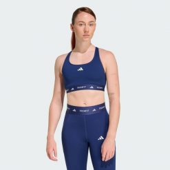 Biustonosz TECHFIT. Niebieskie biustonosze Adidas, bez wzorów, z materiału. Za 179.00 zł.