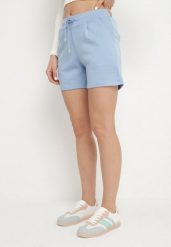Jasnoniebieskie Szorty Dresowe przed Kolano z Wiązaniem w Pasie Dulcima. Niebieskie szorty damskie Born2be, bez wzorów, z dresówki, eleganckie. Za 44.99 zł.