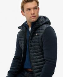 Superdry Kurtka Hooded Storm Fleece Hybrid – Ocieplany przód, rękawy z polaru. Niebieskie kurtki damskie Superdry., xl, bez wzorów, z polaru, bez kaptura. Za 559.35 zł.