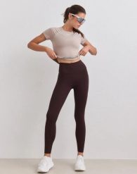 Damskie legginsy z wysokim stanem, squat proof, z kieszeniami Sense czekoladowe. Brązowe legginsy damskie Aim'n, xl, bez wzorów, z elastanu. Za 347.00 zł.