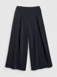 4F Spodnie dresowe z szerokimi nogawkami modalem damskie - czarne XL. Czarne spodnie dresowe damskie 4f, xl, bez wzorów, z dresówki. Za 189.99 zł.