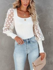 LA Angels Bluzka w kolorze białym rozmiar: L. Białe bluzki damskie LA Angels, l, bez wzorów, z tiulu, bez kołnierzyka, bez ramiączek. Za 113.99 zł.